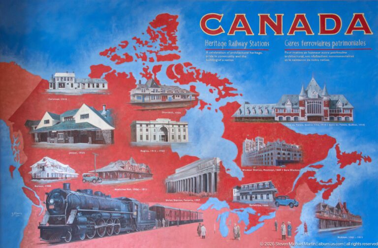 Bilingual Canada heritage railway stations display with a red national map, illustrated stations, and a steam locomotive.