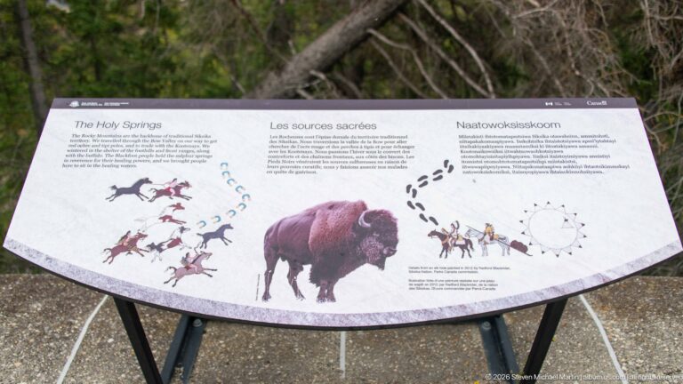 A “The Holy Springs” panel shows a bison, riders, footprints, and a sun-like symbol.