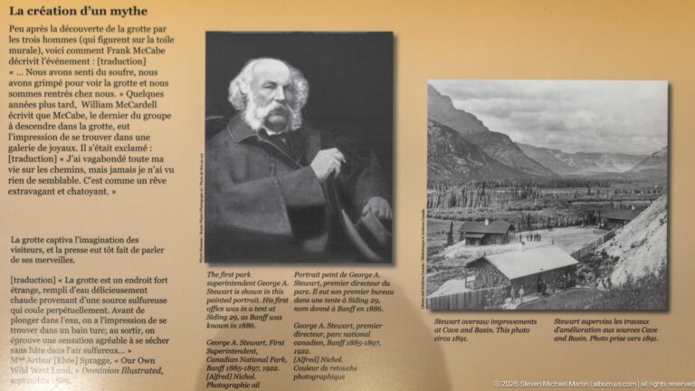 A portrait of George A. Stewart and an archival valley photograph appear on a bilingual exhibit panel.