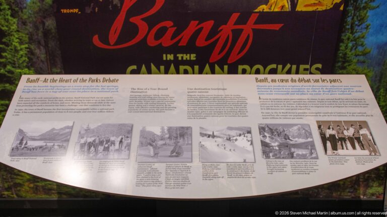 A Banff exhibit titled “At the Heart of the Parks Debate” displays a row of historic photographs.
