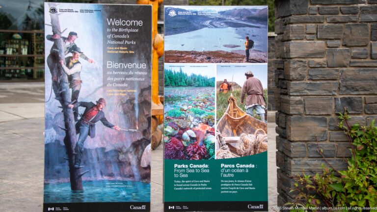 Pair of illustrated Parks Canada banners about national parks, with people and landscapes in outdoor settings.