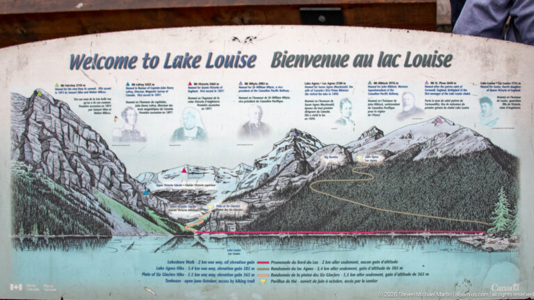 A bilingual “Welcome to Lake Louise” panel shows an illustrated map of the lake and surrounding mountains.