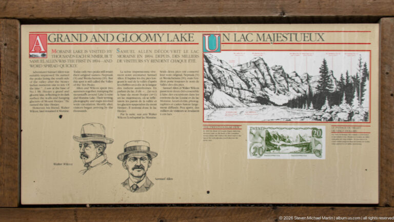 Bilingual Moraine Lake history panel titled A Gloomy Lake and Un lac majestueux with portraits and landscape drawing.