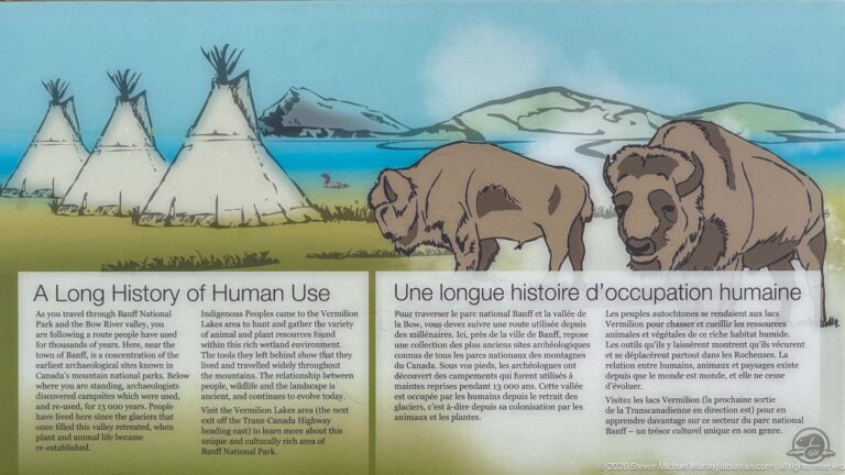 Bilingual “A Long History of Human Use” panel illustrated with tipis, bison, mountains, and a lake.