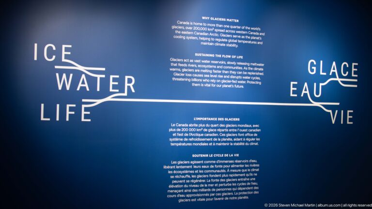 Blue bilingual Ice Water Life and Glace Eau Vie exhibit wall explaining why glaciers matter and sustain water flow.