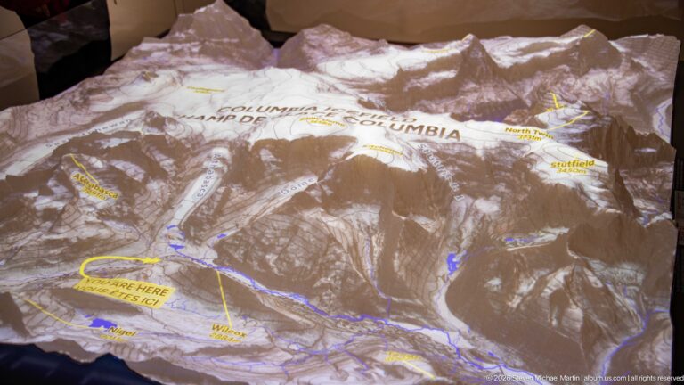 Three-dimensional relief map projected with Columbia Icefield, glacier, trail, and You Are Here labels.