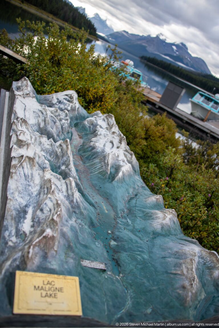 A three-dimensional Maligne Lake terrain model is viewed obliquely with the actual lake visible beyond