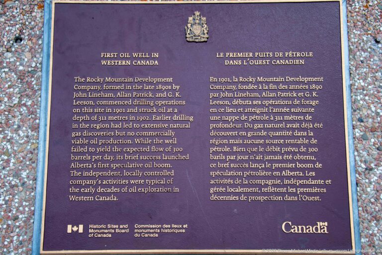 Purple bilingual plaque titled First Oil Well in Western Canada, with federal crest and Historic Sites and Monuments Board markings.